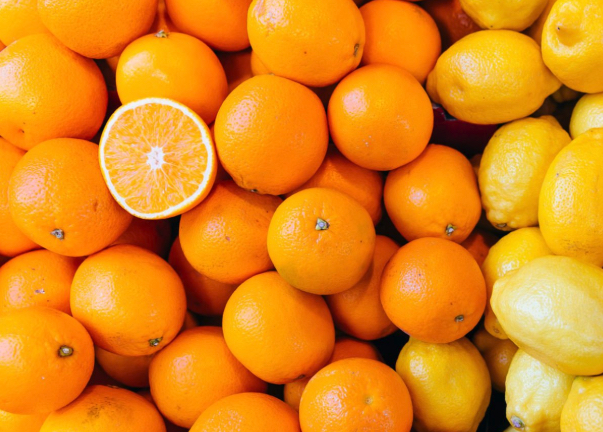 Lemons and oranges stocked together